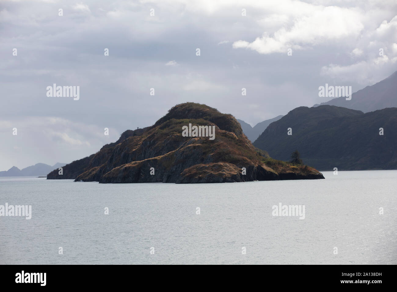 A big Rock/ Island in the middle of a lake, Inlet Stock Photo