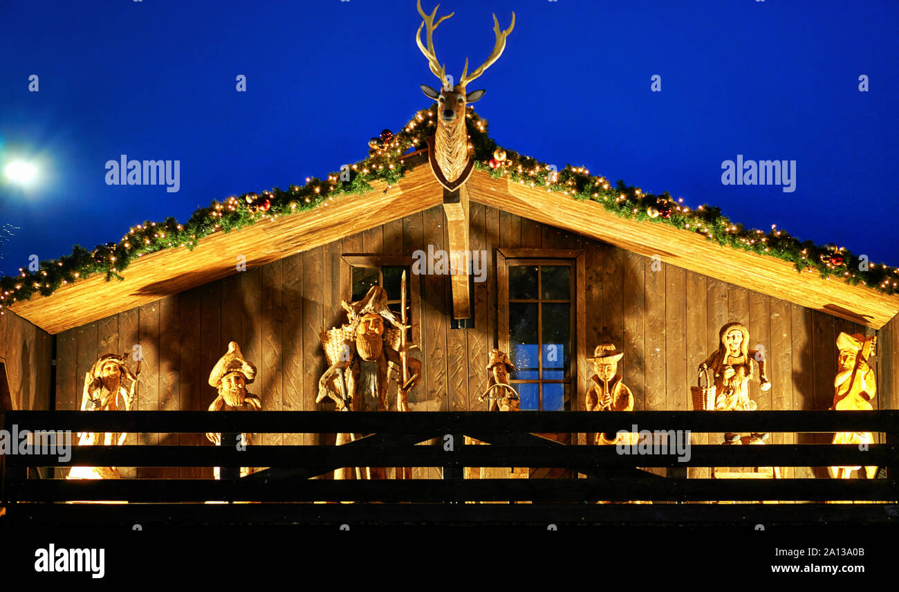 Nativity scene on a wooden house at the Christmas market .. Stock Photo