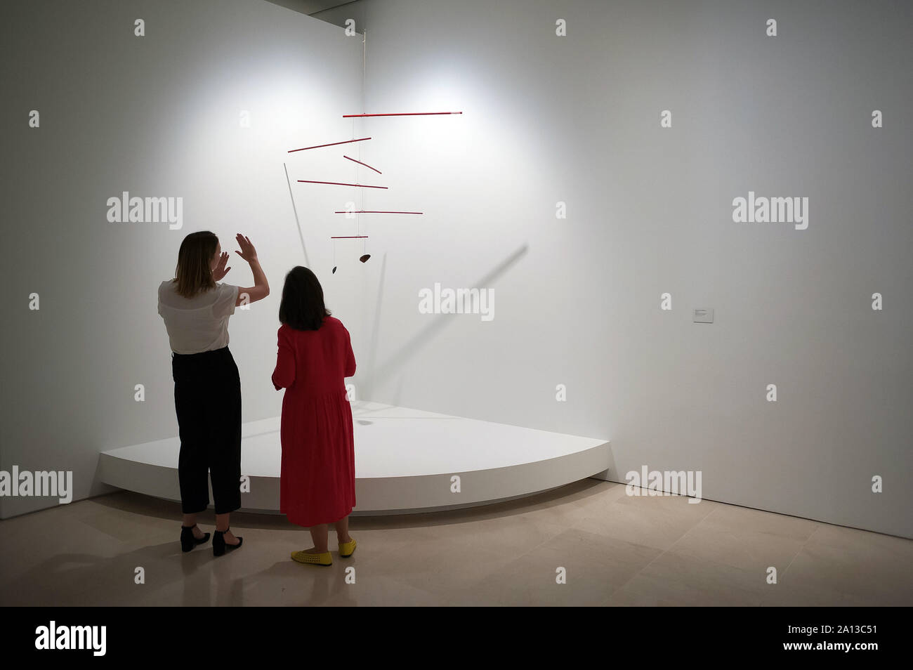 Visitors are seen looking the artwork during the exhibition Calder and Picasso at Picasso Malaga Museum.The new exhibition with paintings and sculptures, shows for the first time in Spain the modern creative relation between Spanish artist Pablo Ruiz Picasso and American Alexander Calder. Stock Photo
