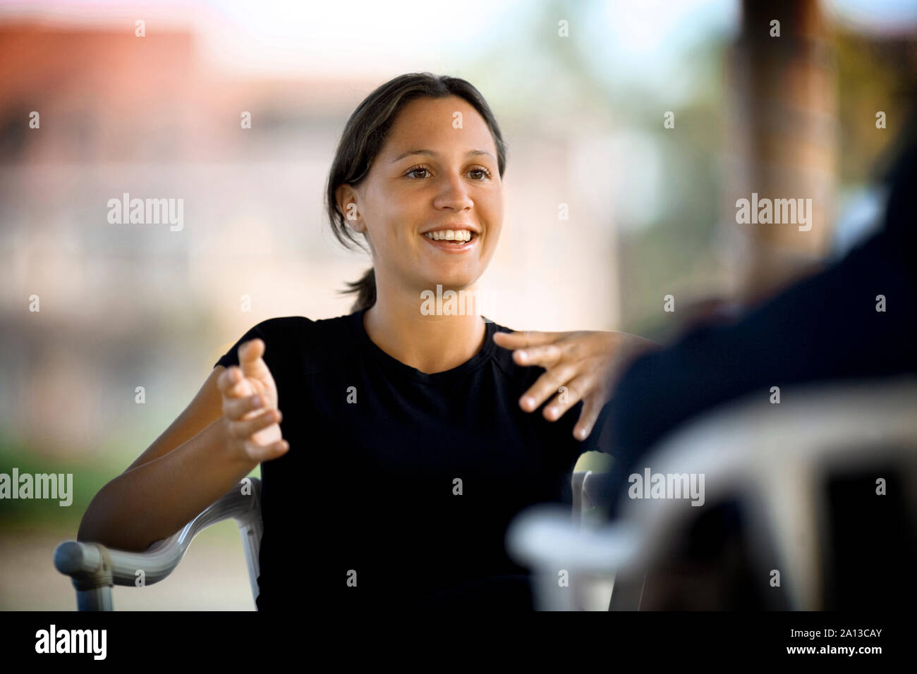 Relaxed young black woman talking hi-res stock photography and images ...
