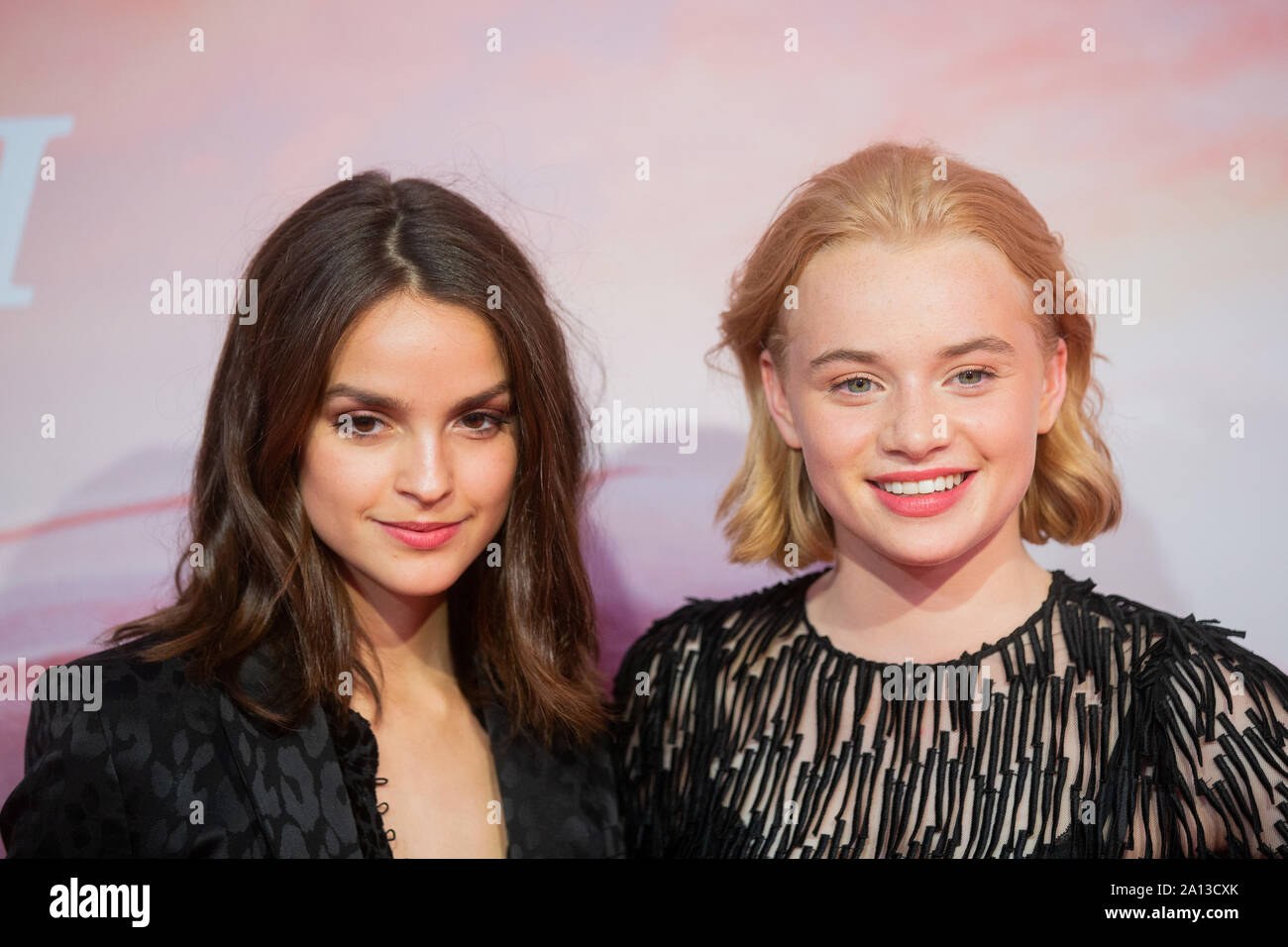 Cologne, Germany. 23rd Sep, 2019. Luise Befort (l) and Luna Wedler,  actresses, stand on the red carpet at the world premiere of the literary  film "Dem Horizont so nah" in the Cinedom.