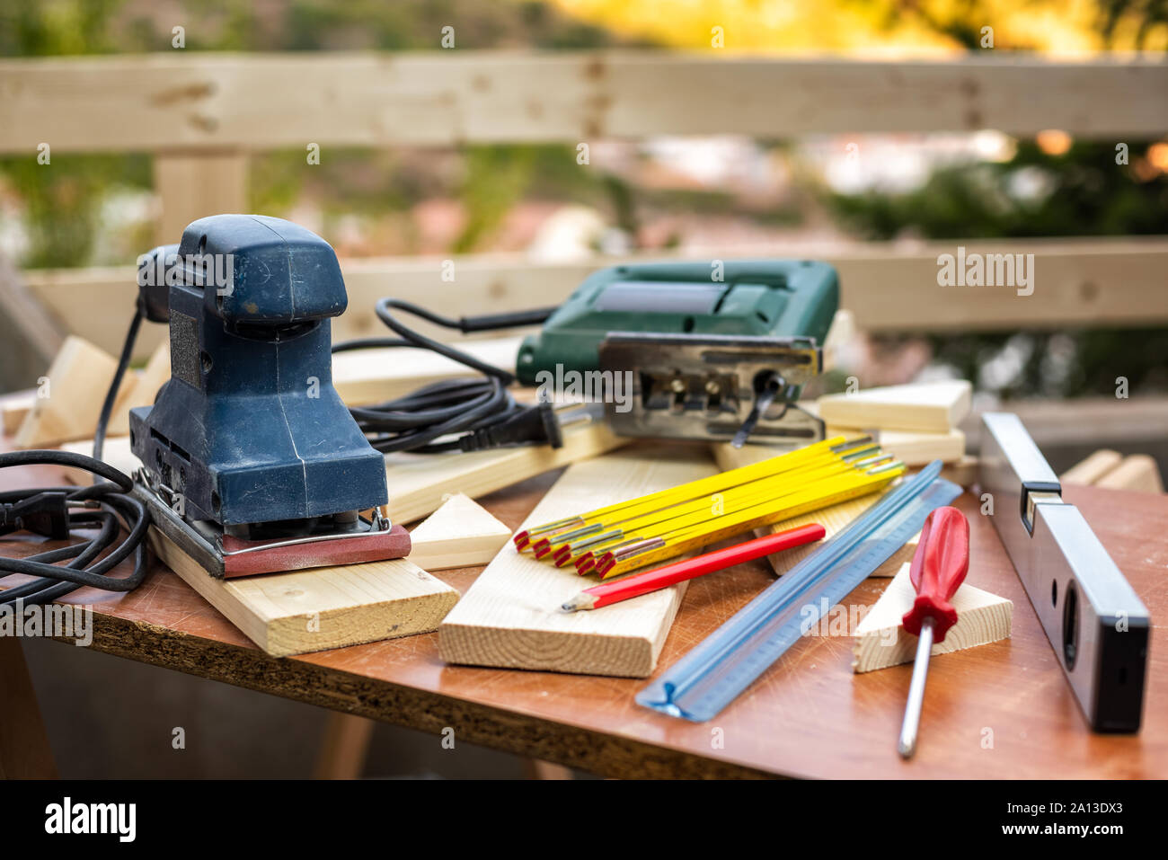 Professional woodworking tools, electric sander to smooth the wood. Housework do it yourself