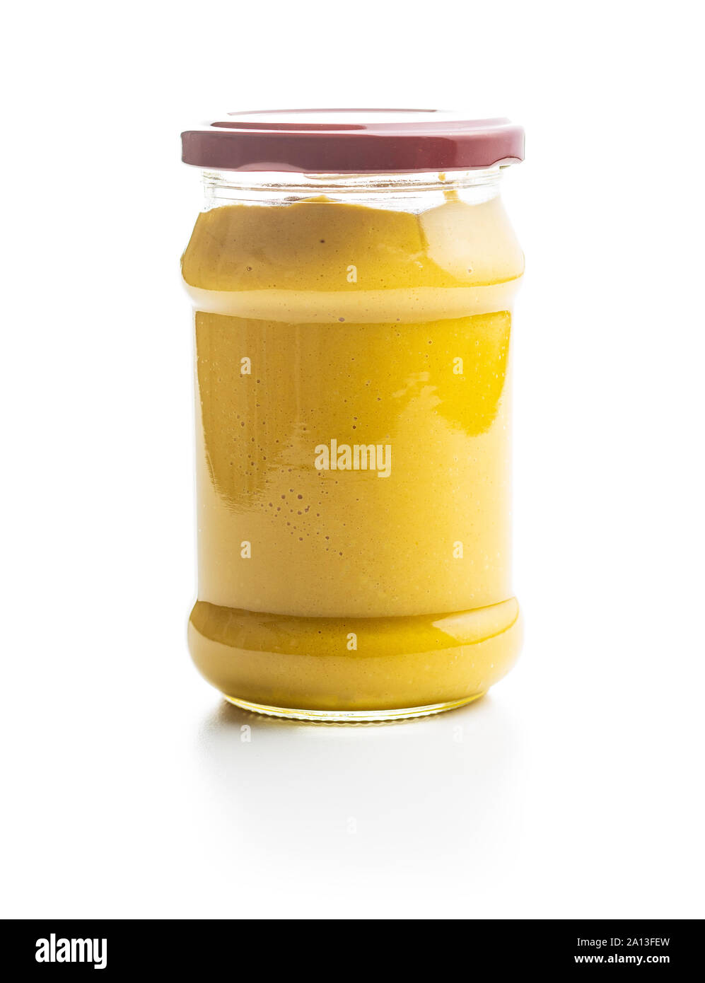 Yellow mustard in jar isolated on white background Stock Photo - Alamy