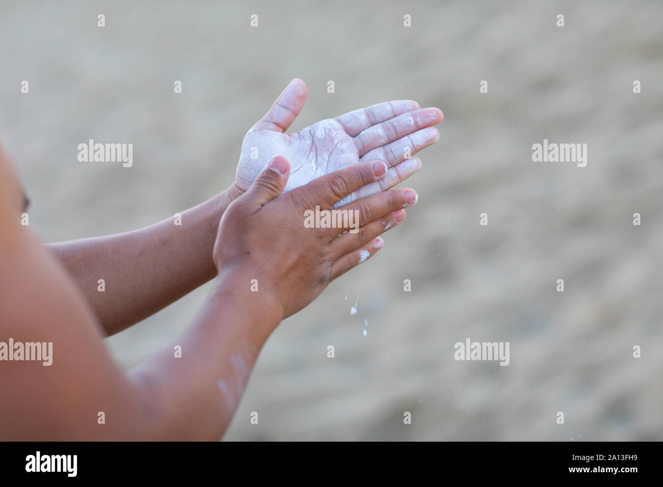 Gym Chalk hands clapping man for climbing workout on the beach, muscle