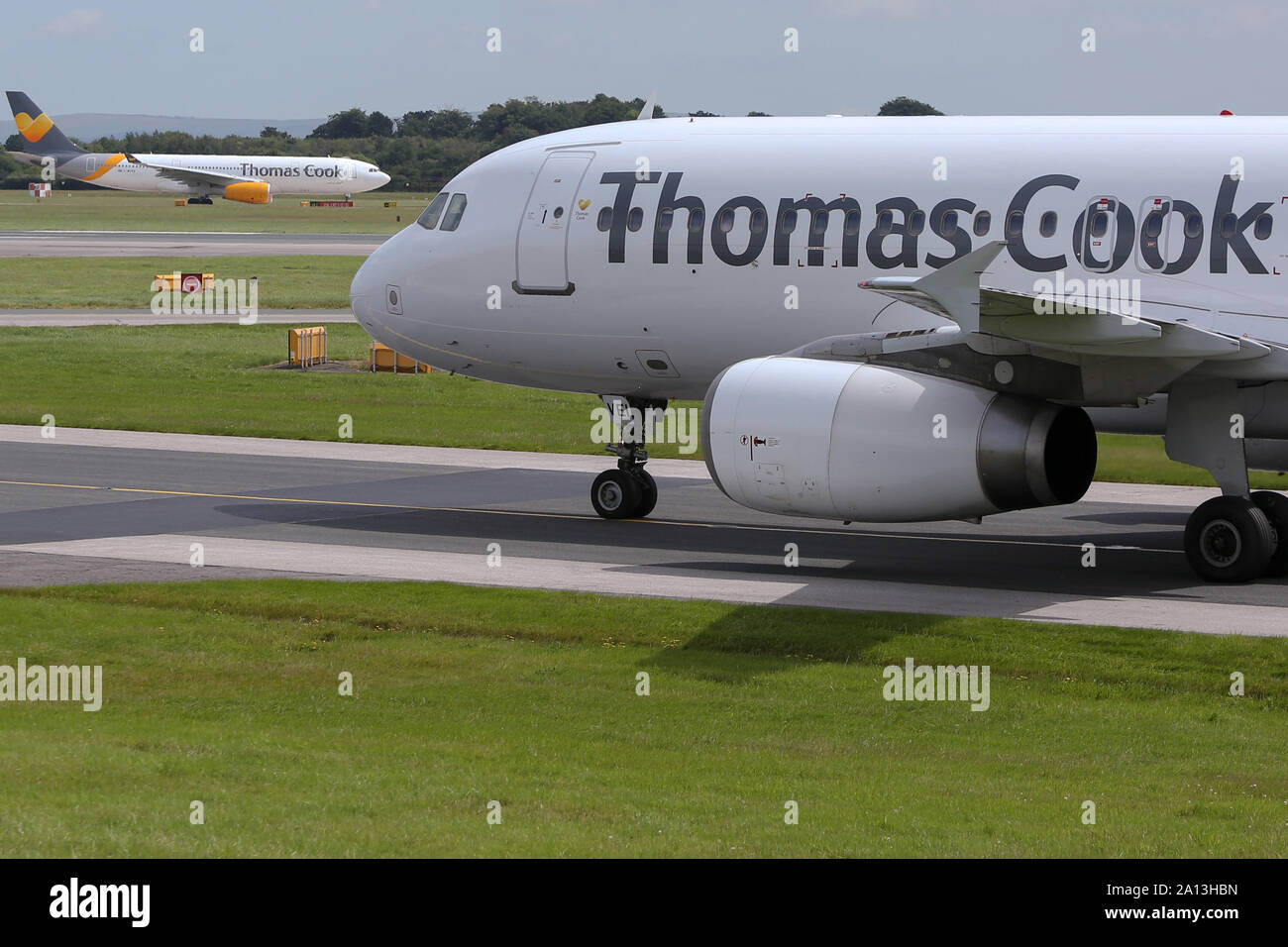 (File images) Thomas Cook civil jet airliners captured at Manchester International Airport, Great Britain. As reported on Monday, 23 Sep 2019, Thomas Cook Group Plc, the 178-year travel company that became one of the U.K.’s best-known brands, has collapsed under a pile of debt, leaving tens of thousands of British tourists stranded across Europe. Stock Photo