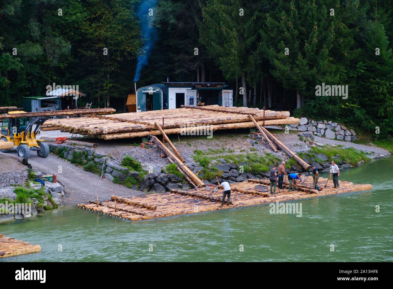 Assembly of rafts on the Isar near Wolfratshausen early in the morning, Upper Bavaria, Bavaria, Germany Stock Photo