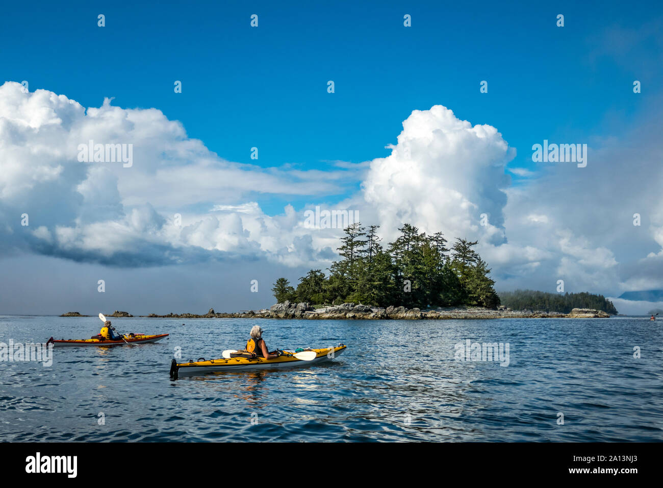 Kayakers Paddle Among The The Broken Group Islands In Pacific Rim National Park Reserve British Columbia Canada Stock Photo Alamy<script async src=