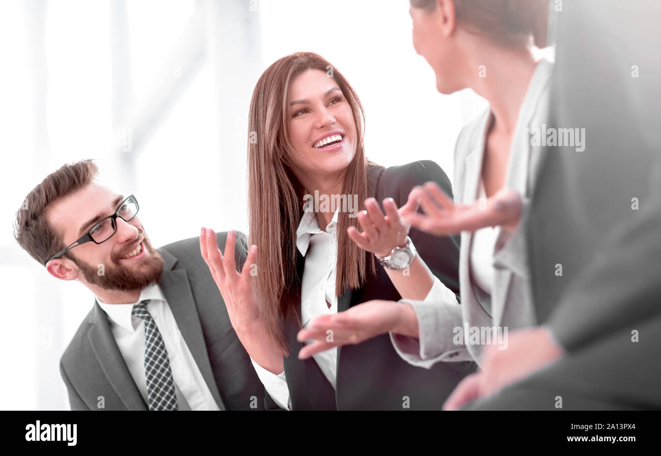 close up.successful employees listen to their boss Stock Photo - Alamy