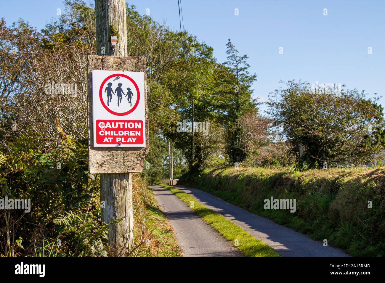 caution children at play warning sign on a country road Stock Photo
