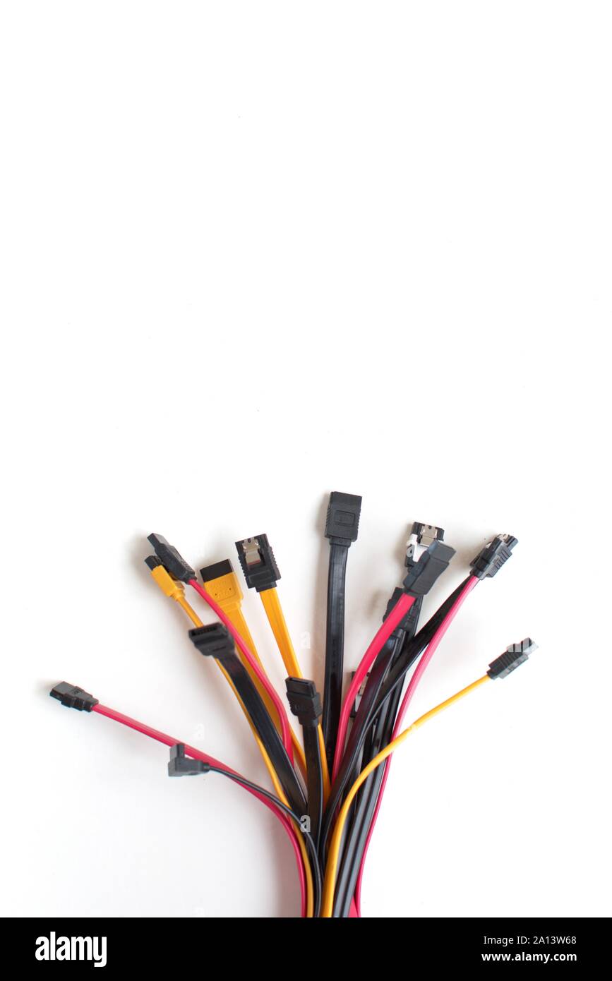Red, black and yellow computer data cables. Data storage, network server infrastructure concept. Plenty of negative space. Stock Photo