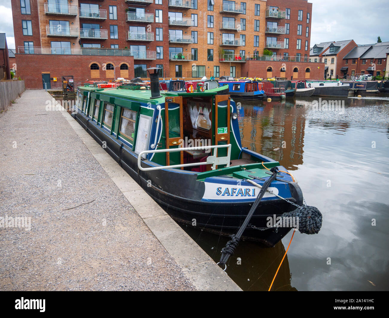 A floating cafe in a canal narrowboat, the Safari, at Droylsden Marina, on the Ashton Canal, Tameside, Manchester, UK Stock Photo