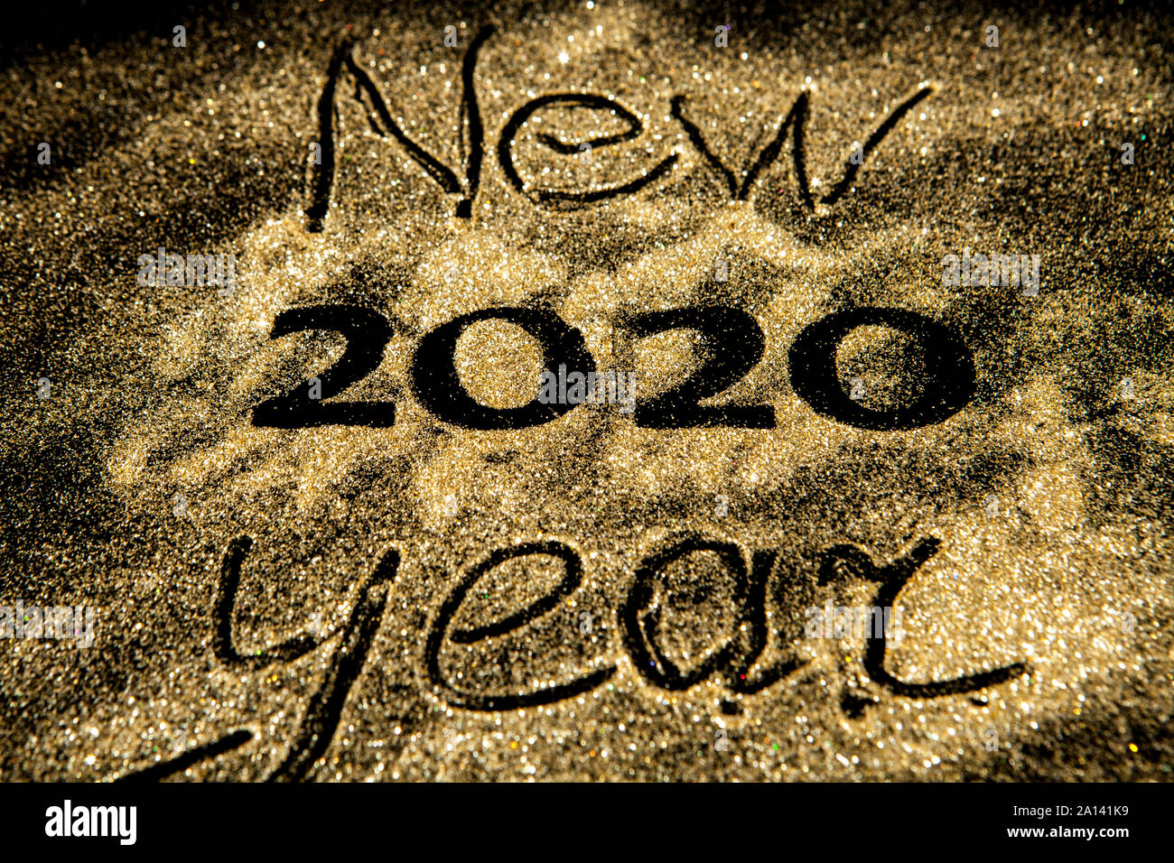 Happy New Year 2020. Beautiful sparkling Golden number 2020 on black ...