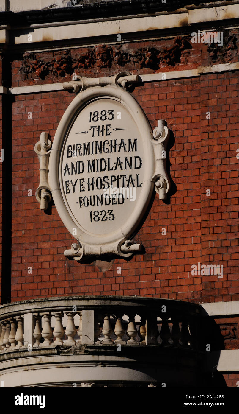 Ornate tablet on a wall of the former Birmingham & Midland Eye Hospital (now a hotel), in Birmingham, Warwickshire, England Stock Photo