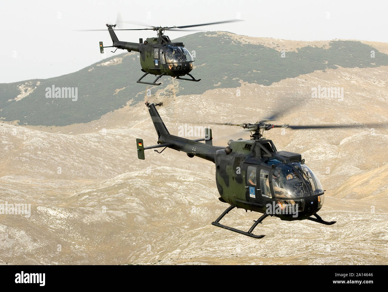 Two German Army Bo-105P helicopters near Mount Igman in Bosnia ...