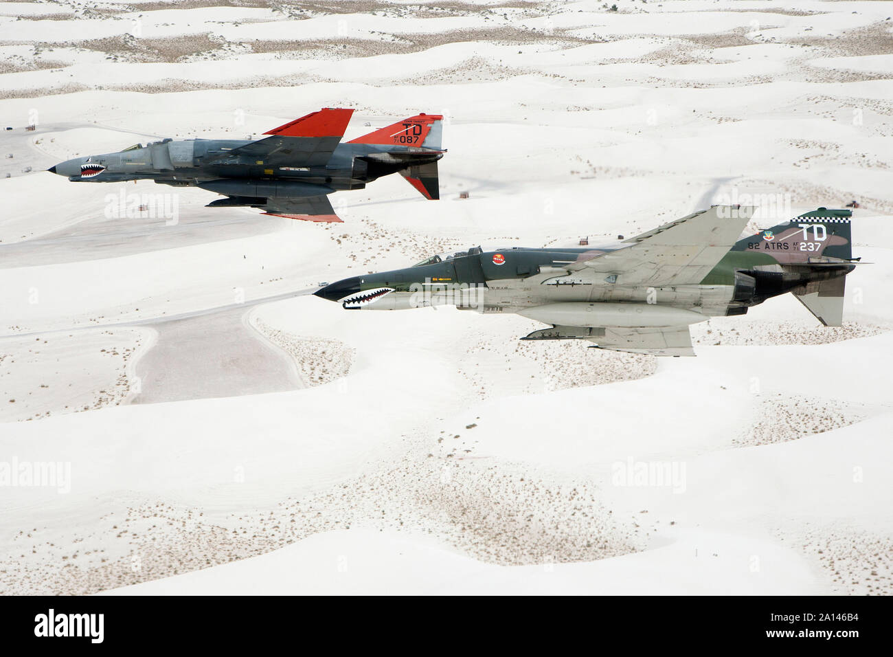 Two QF-4E Phantoms in formation over the White Sands National Monument in New Mexico. Stock Photo