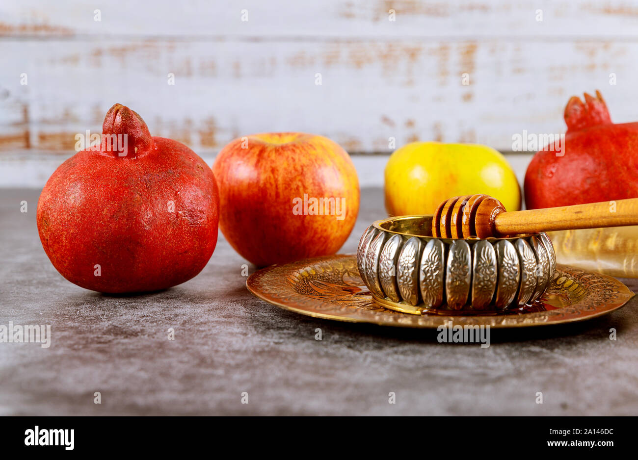 A jewish new year with honey for the apple and pomegranate holiday of Yom Kippur and Rosh