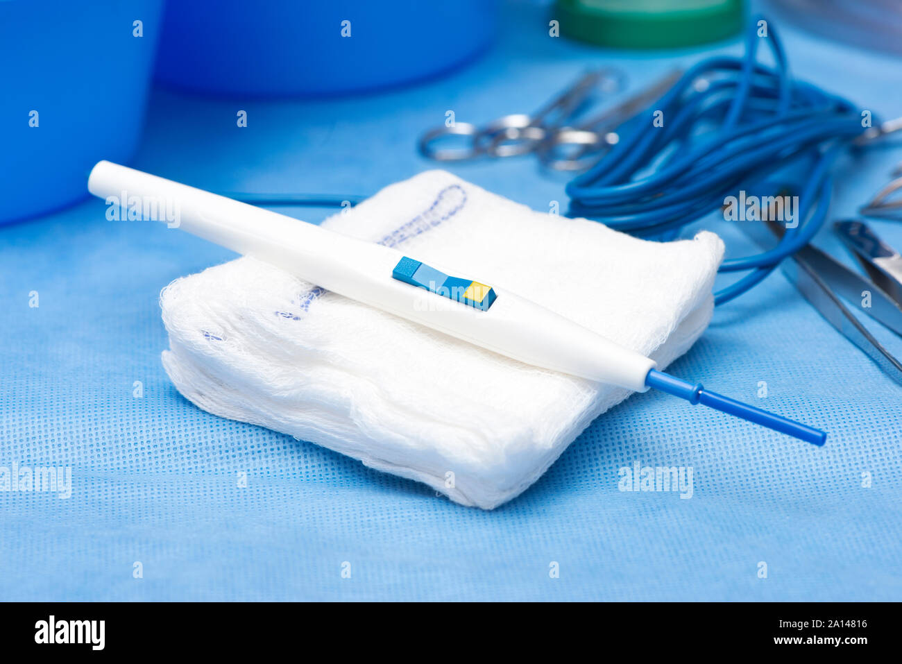 Surgical electrocautery device on sterile surgical table. Stock Photo