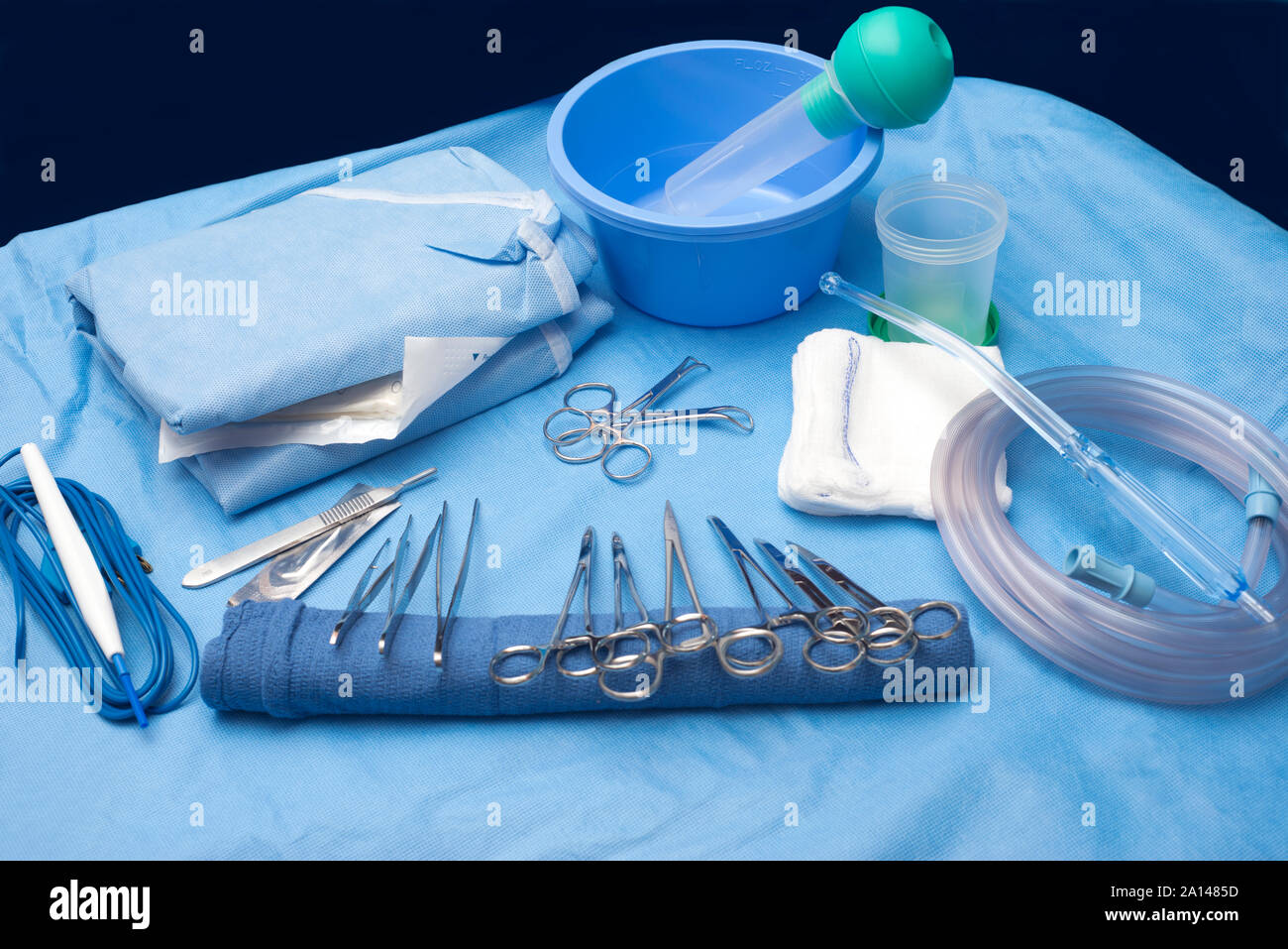 Surgical table with sterile drape and instruments. Stock Photo