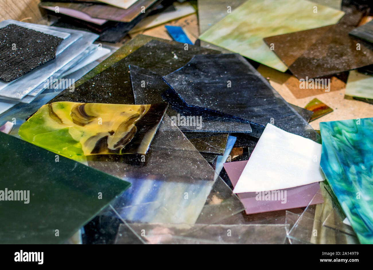 Colorful scraps of stained glass are for sale at a glass shop, sold in