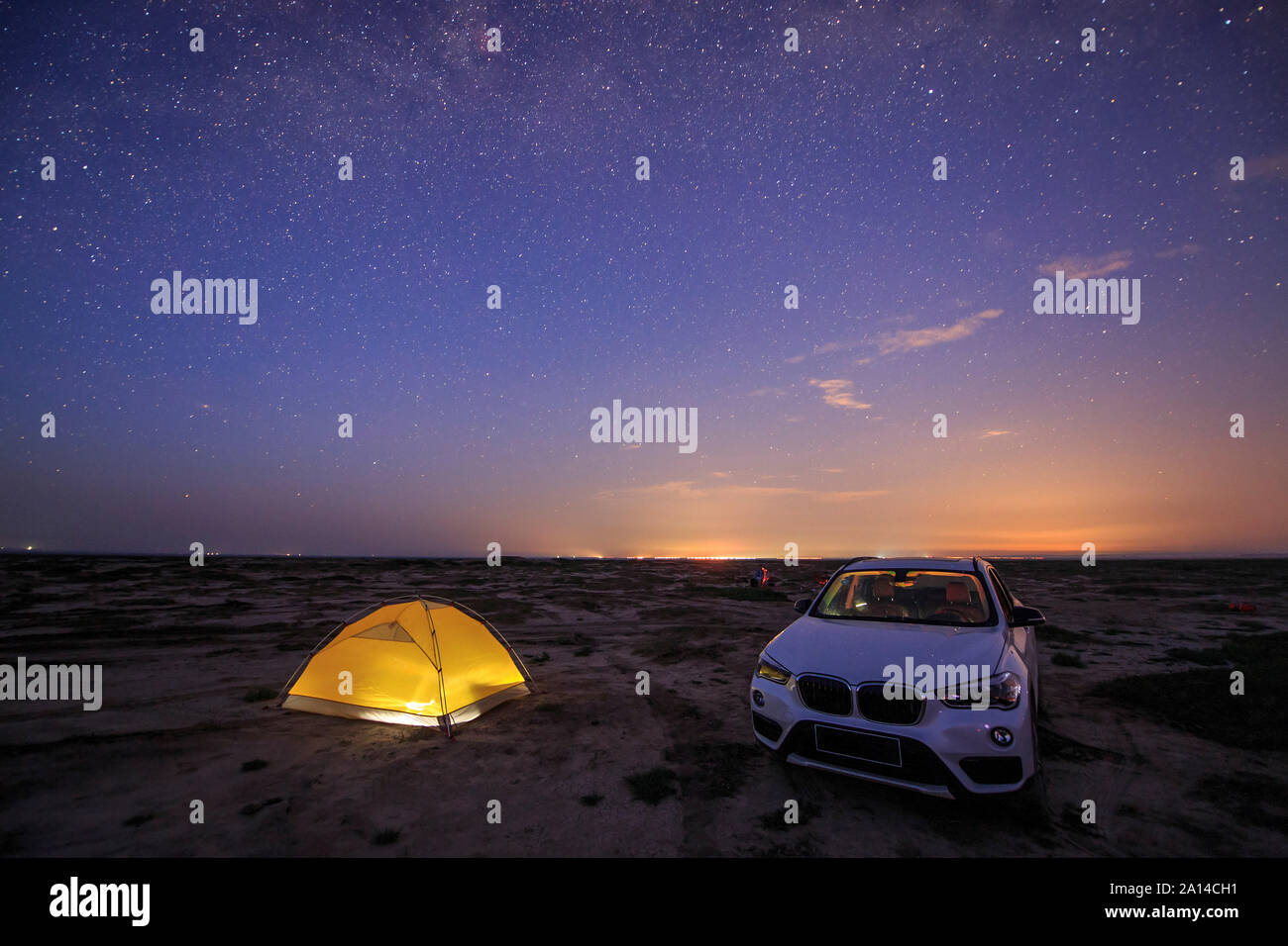 Stars and light pollution from a camping site in Hebei, China. Stock Photo