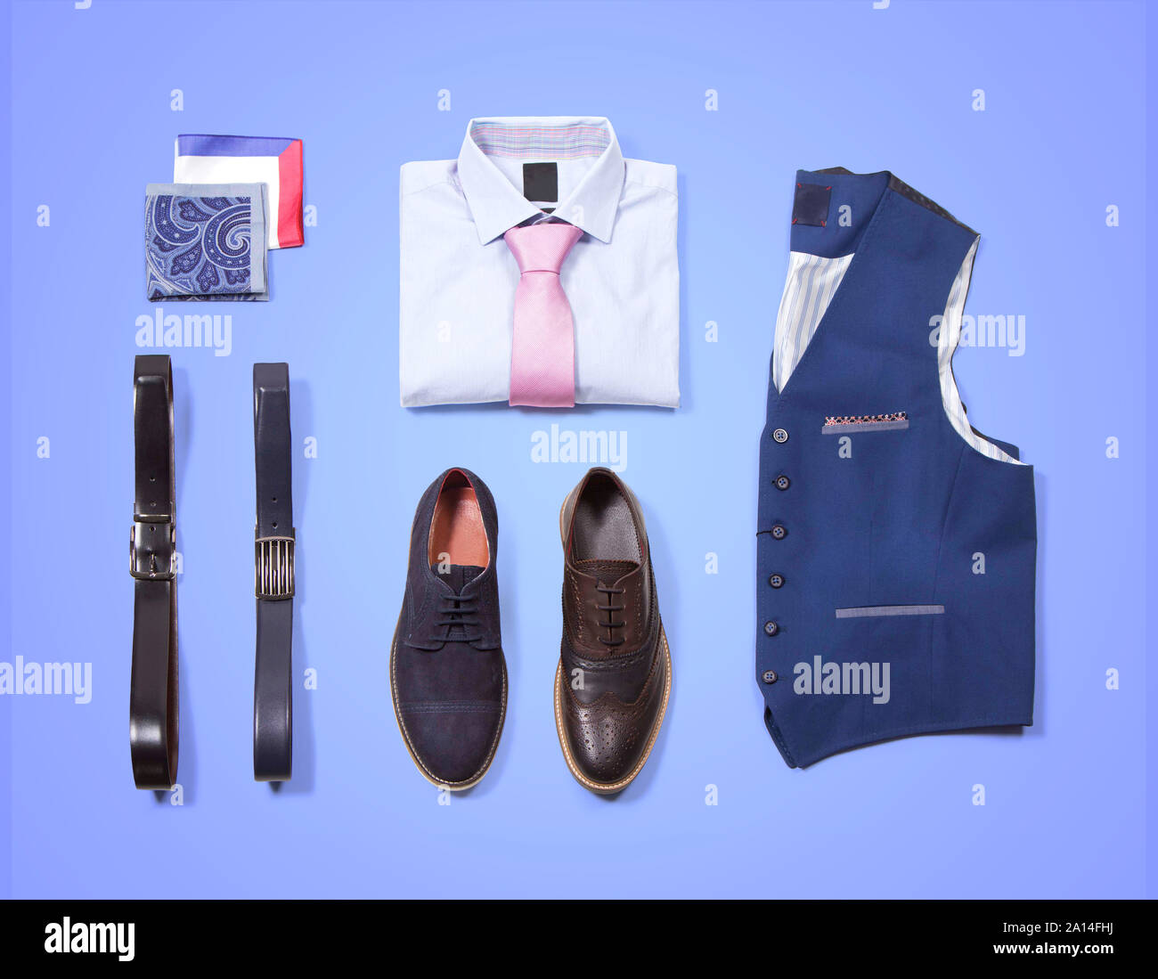 Men's office clothing. Shirt with tie, shawl, vest, belt and shoes