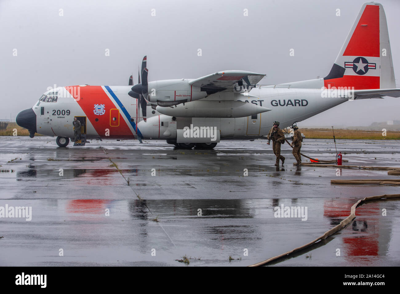 A U.S. Coast Guard C130 participates in forward arming and refueling