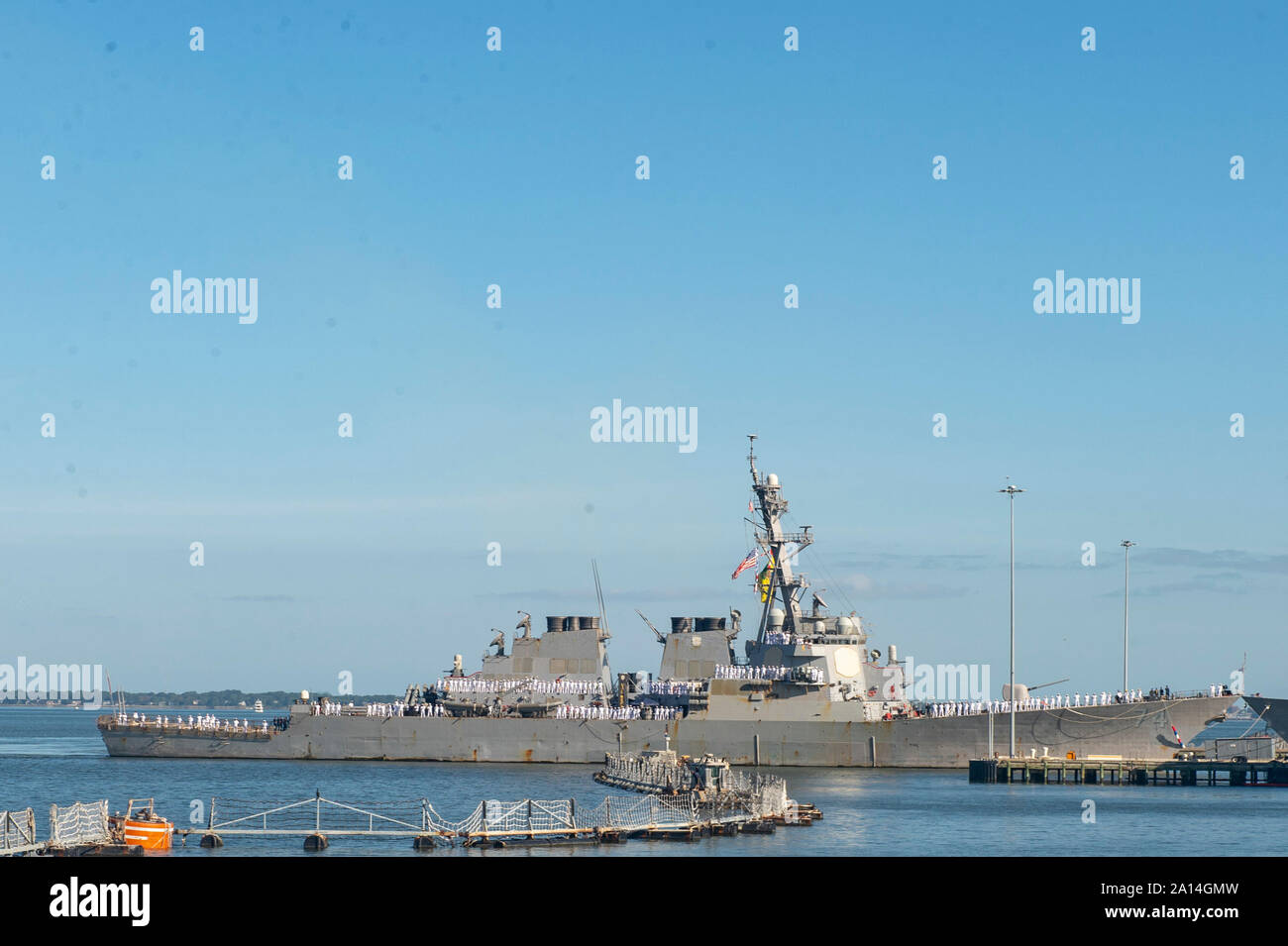 190920-N-DV626-0011  NORFOLK, Va. (Sept. 20, 2019) The Arleigh-Burke class guided-missile destroyer USS McFaul (DDG 74) returns to Naval Station Norfolk. McFaul completed an eight-month deployment to the U.S. 5th and 6th fleet areas of operation. (U.S. Navy photo by Mass Communication Specialist 3rd Class Gian Prabhudas) Stock Photo