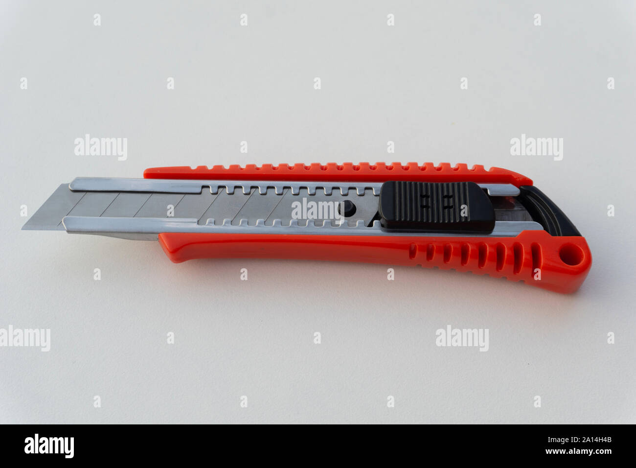 A red cutter isolated on white background Stock Photo - Alamy