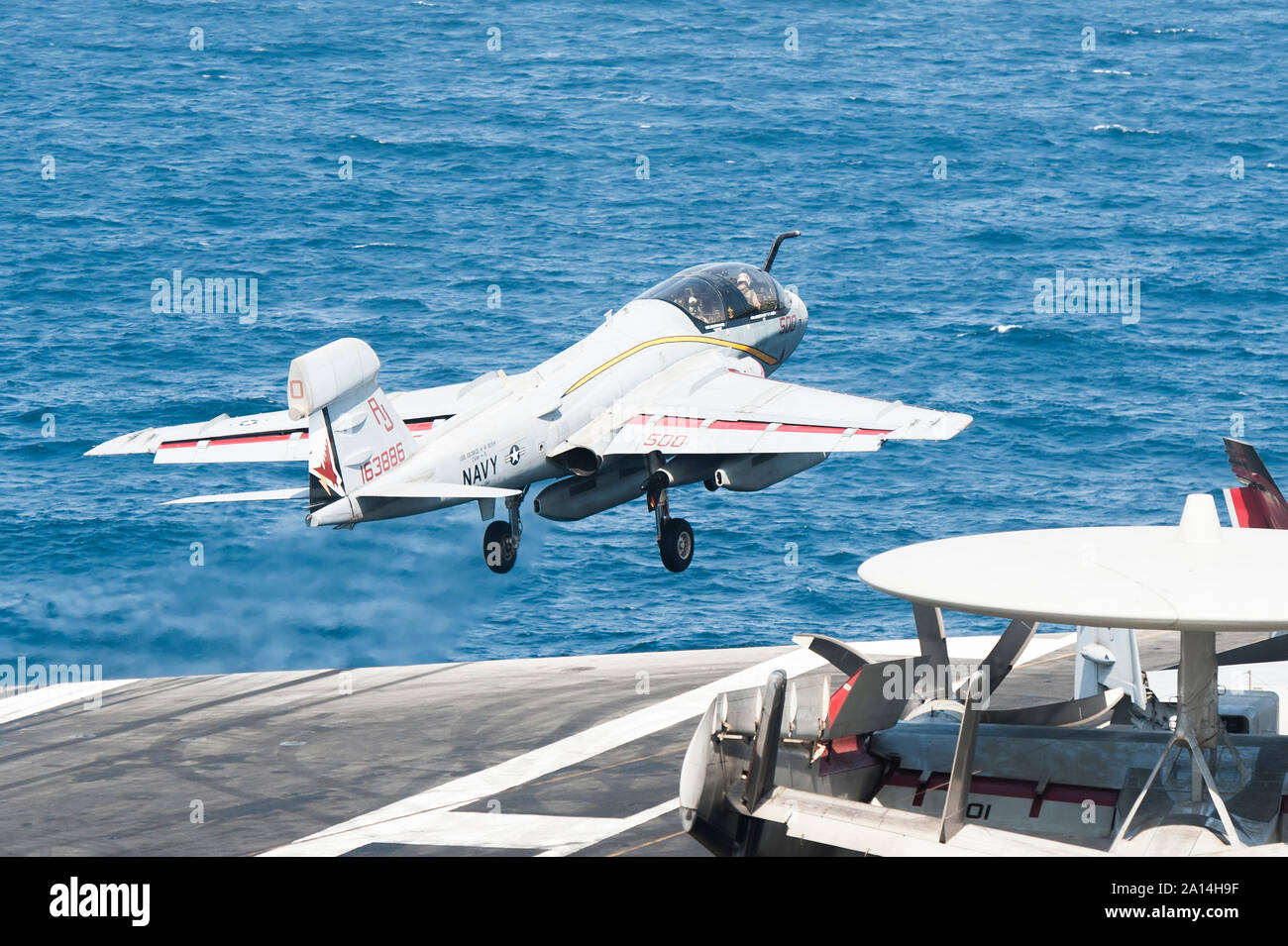 An EA-6B Prowler takes off from the flight deck of USS George H.W. Bush. Stock Photo