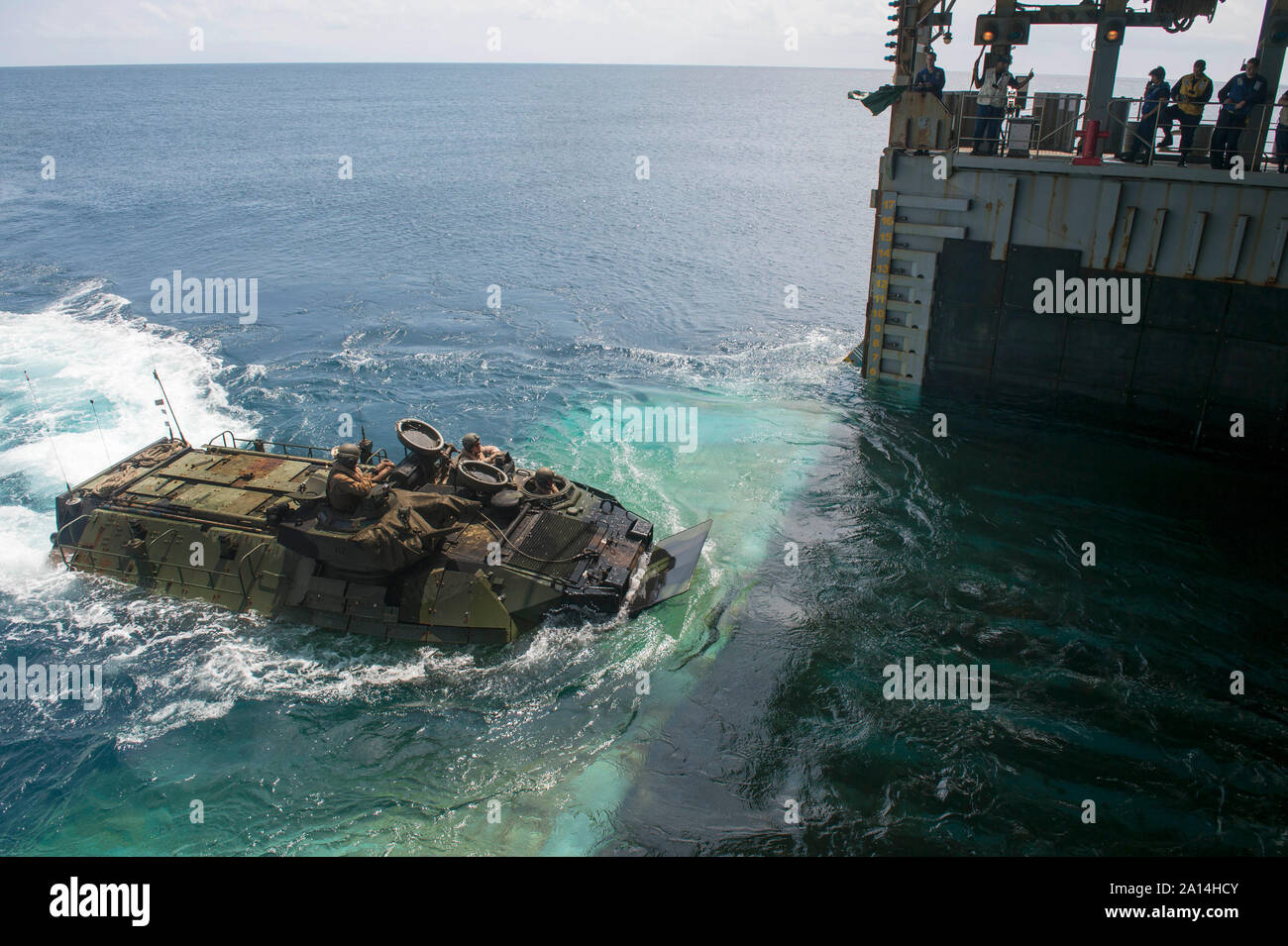 An amphibious assault vehicle embarks the well deck of USS Germantown. Stock Photo
