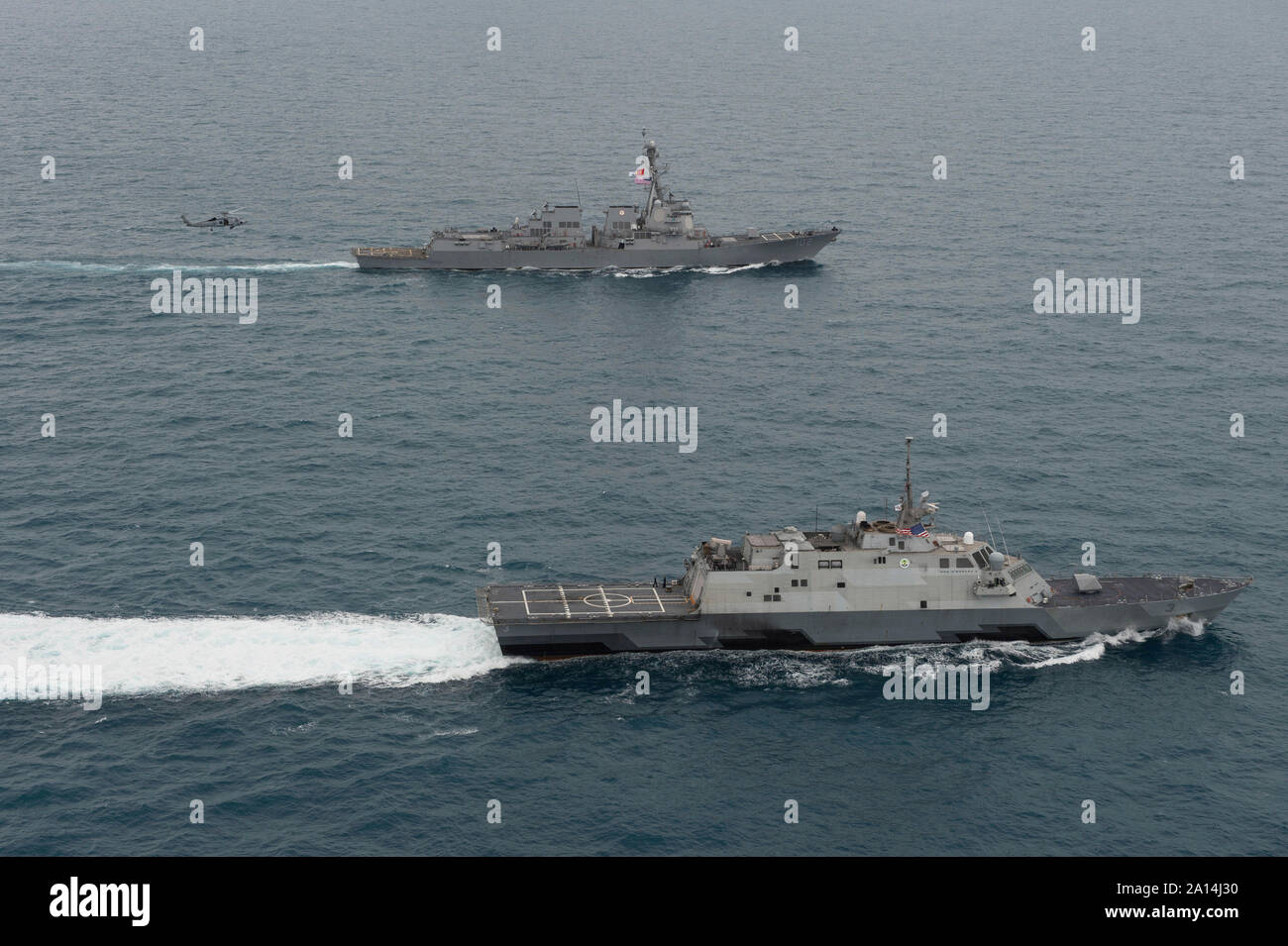 The littoral combat ship USS Fort Worth and USS Sampson operating in the Java Sea. Stock Photo