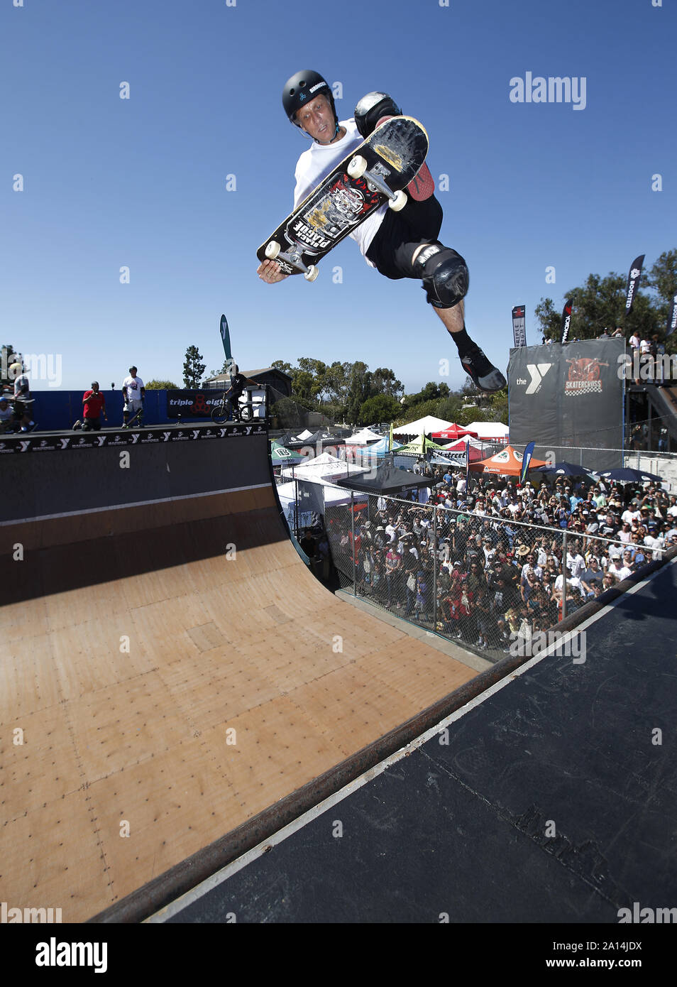 San Diego, California, USA. 21st Sep, 2019. Professional skateboarder Tony  Hawk does an aerial on a half pipe during the Clash at Clairemont, a  fundraiser for the Mission Valley YMCA/Krause Family Bike