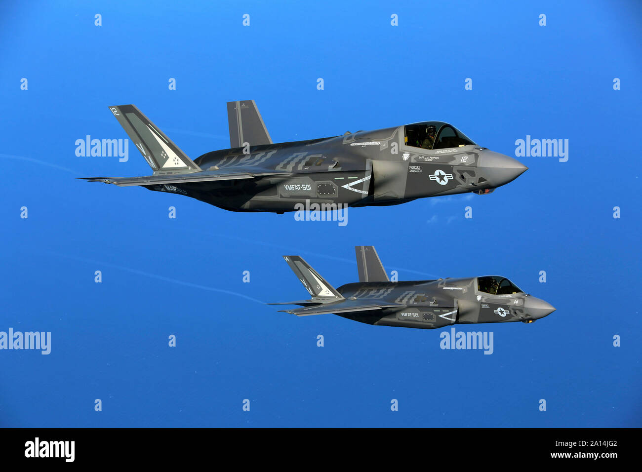Two F-35B joint strike fighter jets conduct aerial maneuvers. Stock Photo