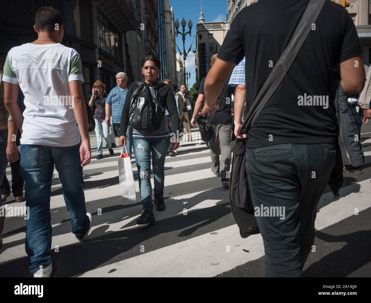 Buenos Aires, Argentina - March 21 2013: Pedestrians on the sreets of Buenos Aires city. This photo shows the downtown arround Plaza de Mayo. Stock Photo