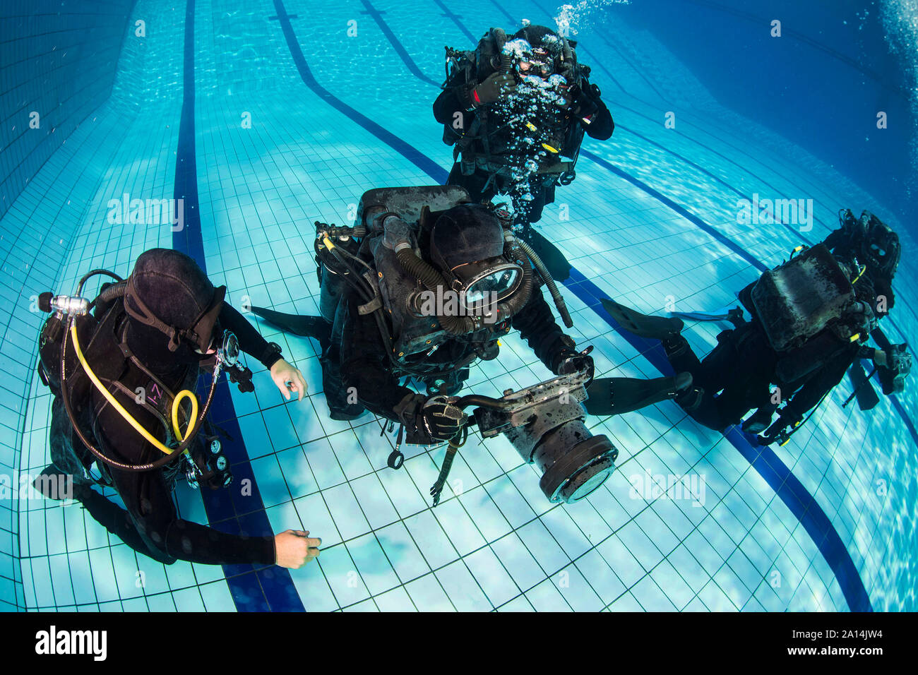 Divers using the DNS-300 underwater sonar system. Stock Photo
