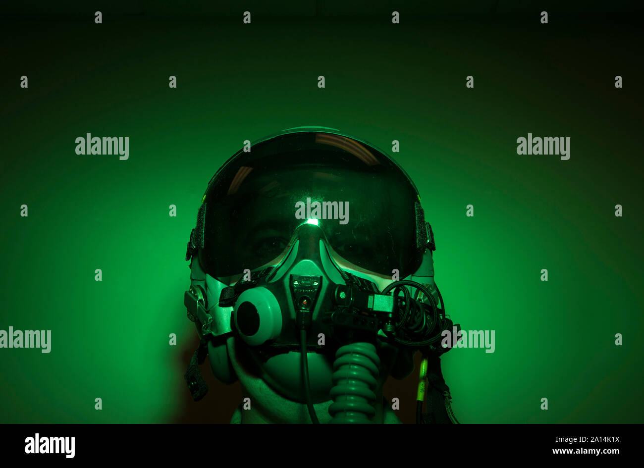 Airman donning flight helmet and night vision goggles Stock Photo Alamy