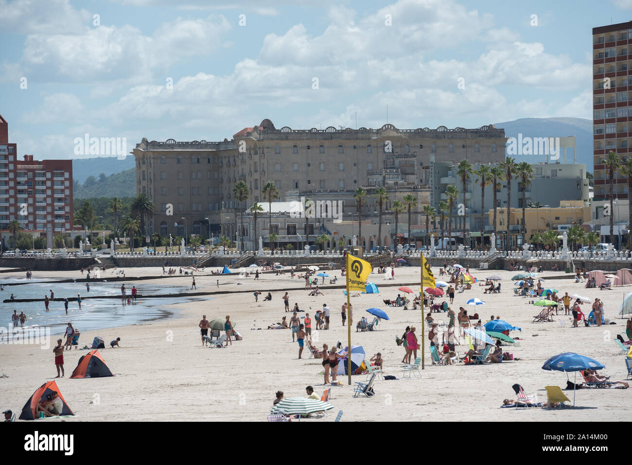 Piriapolis, Uruguay - March 4 2016: The main beach of the city and the Argentino hotel on the background. Stock Photo