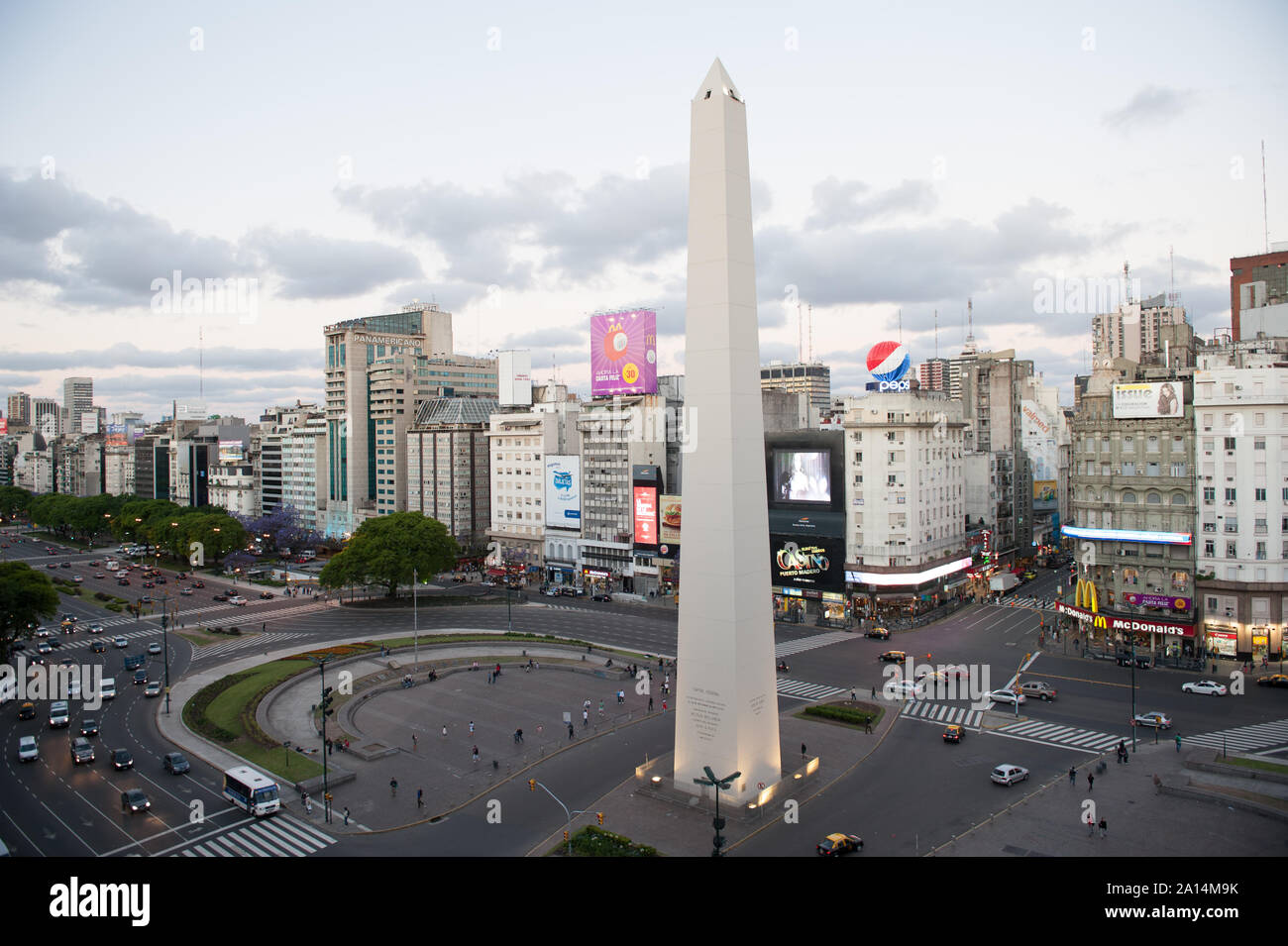 Buenos Aires, Argentina - November 12 2012: Pedestrian and traffic on the sreets of Buenos Aires city. This photo shows the downtown and de 9 de Julio Stock Photo