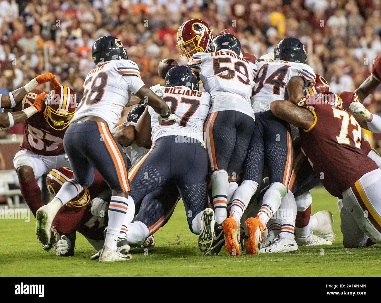 Washington Redskins quarterback Case Keenum (8) tries to jump for a first down on fourth and one in the fourth quarter against the Washington Redskins at FedEx Field in Landover, Maryland on Monday, September 23, 2019. Defending on the play are Chicago Bears inside linebacker Roquan Smith (58), defensive tackle Nick Williams (97), inside linebacker Danny Trevathan (59), and outside linebacker Leonard Floyd (94). Washington Redskins blocking on the play include tight end Jeremy Sprinkle (87) and offensive tackle Donald Penn (72)Credit: Ron Sachs/CNP | usage worldwide Stock Photo