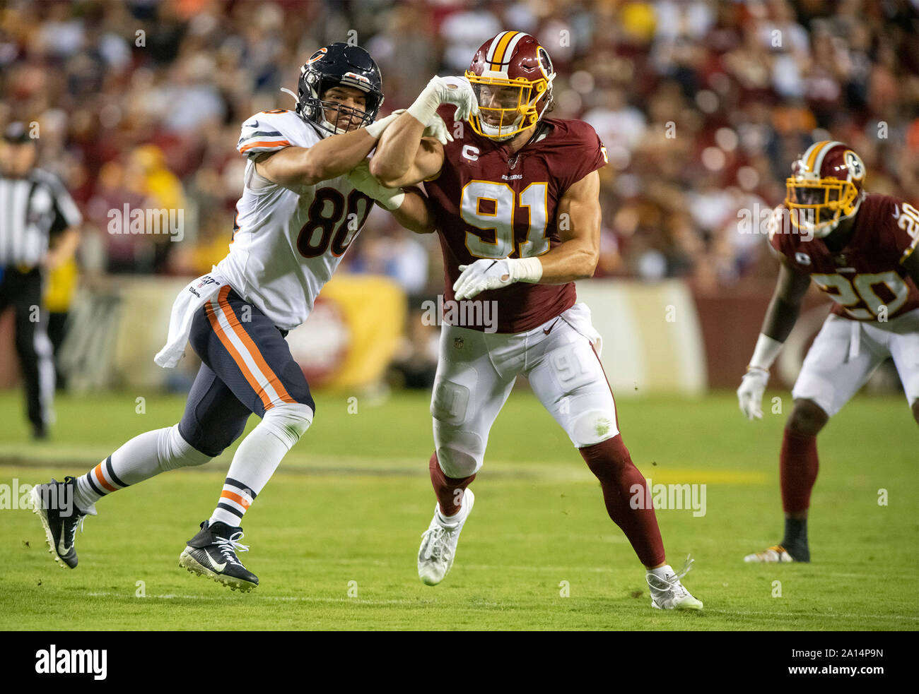 Washington Redskins outside linebacker Ryan Kerrigan (91) sheds the block  of Chicago Bears tight end Trey Burton (80) in fourth quarter action at  FedEx Field in Landover, Maryland on Monday, September 23