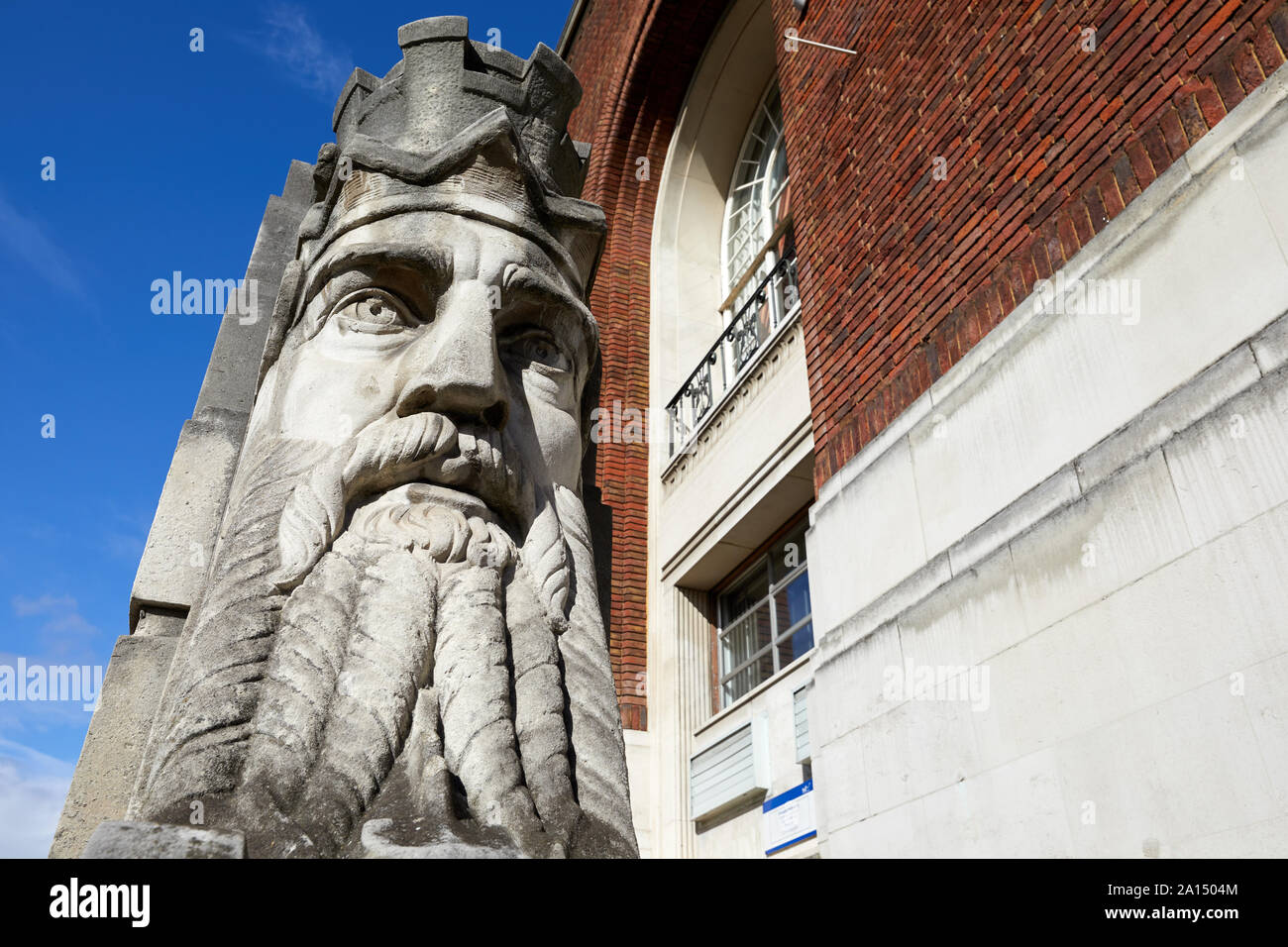 London, U.K. - Sept 23, 2019: One of the two colossal carved heads depicting Father Thames, sculpted by George Alexander, that sit at the southern ent Stock Photo