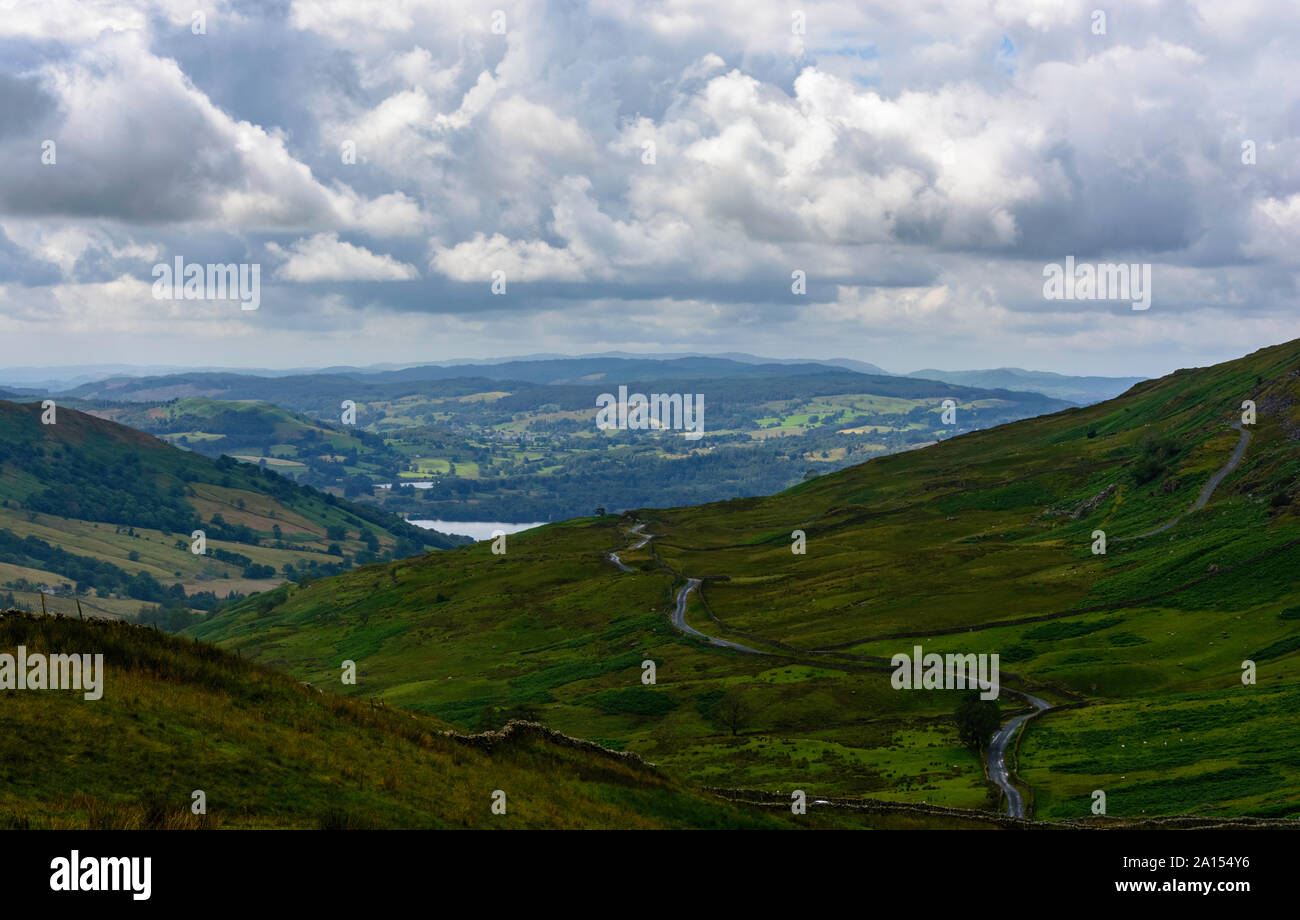 The road in the picture is called 'The Struggle'. It is in the lake districts, United Kingdom. Stock Photo