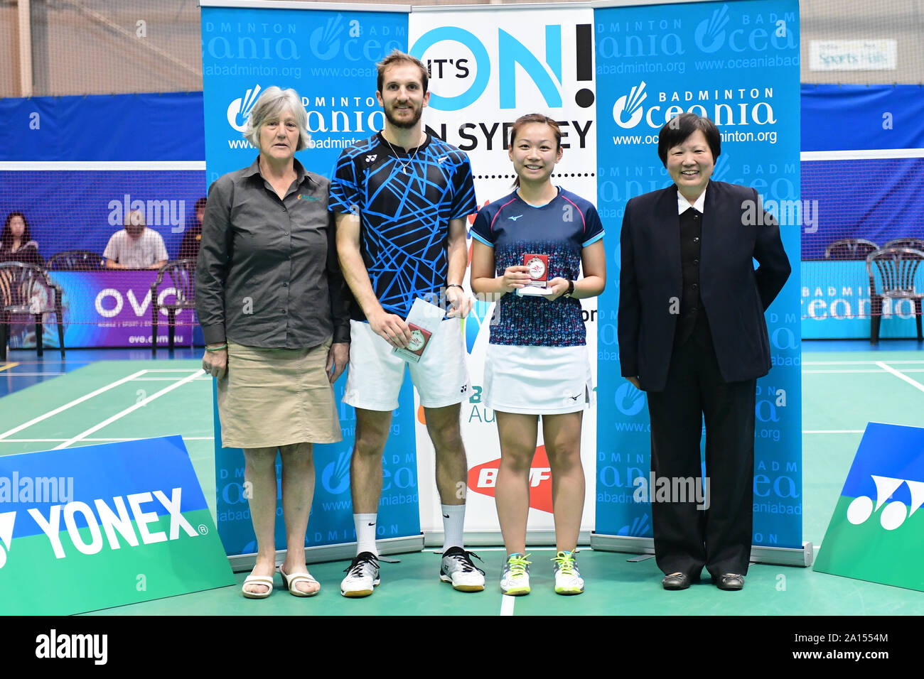 Oliver Leydon-Davis and Anona Pak (New Zealand) are seen during the Mixed Doubles medal awarding ceremony of the 2019 Sydney International.  Leydon-Davis and Pak won the silver medal Seen from left to right: President for Oceania Badminton Confederation Geraldine Brown, Leydon-Davis, Pak and Badminton NSW President Carolyn Toh. Stock Photo