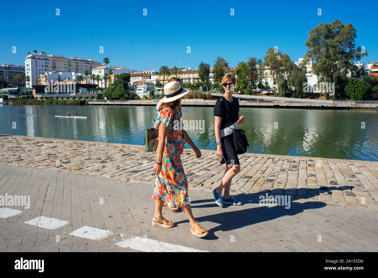 Andalucia river, view of houses and apartments in the Triana barrio quarter of Seville - Sevilla - alongside the Rio Guadalquivir in Andalucia, Spain. Stock Photo