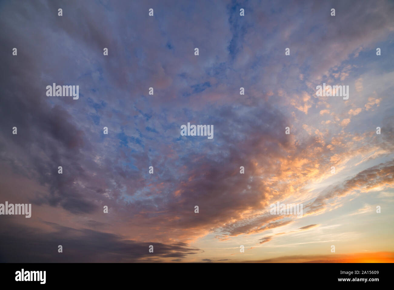 Dramatic sunset sky with orange clouds Stock Photo - Alamy