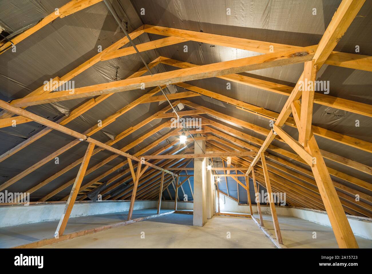 Attic of a building with wooden beams of a roof structure Stock Photo ...