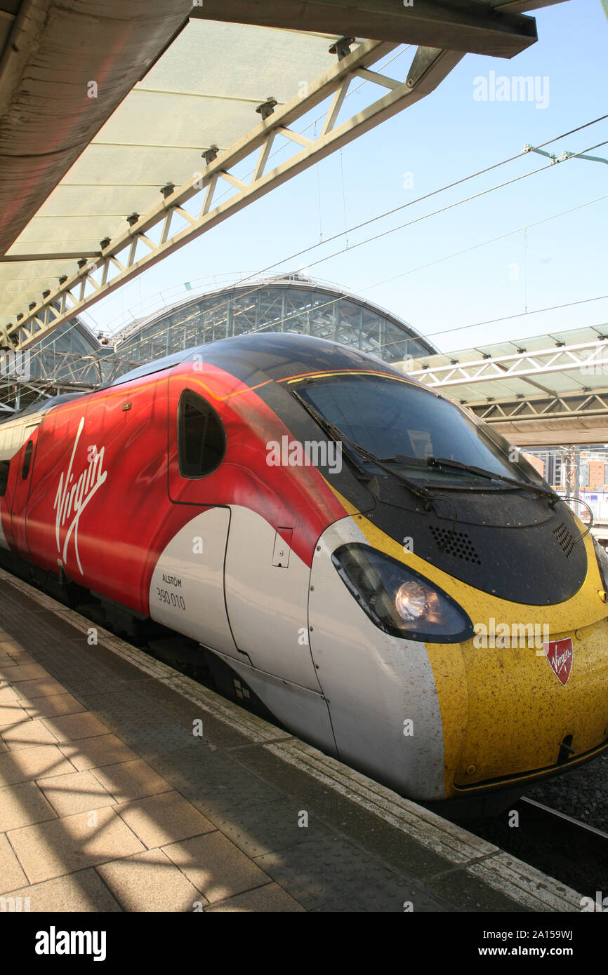Manchester. UK 19 September, 2019.  A Virgin operated train stabled at Manchester Piccadilly Station.  The brand will shortly disappear.  (c)Gedcamera Stock Photo