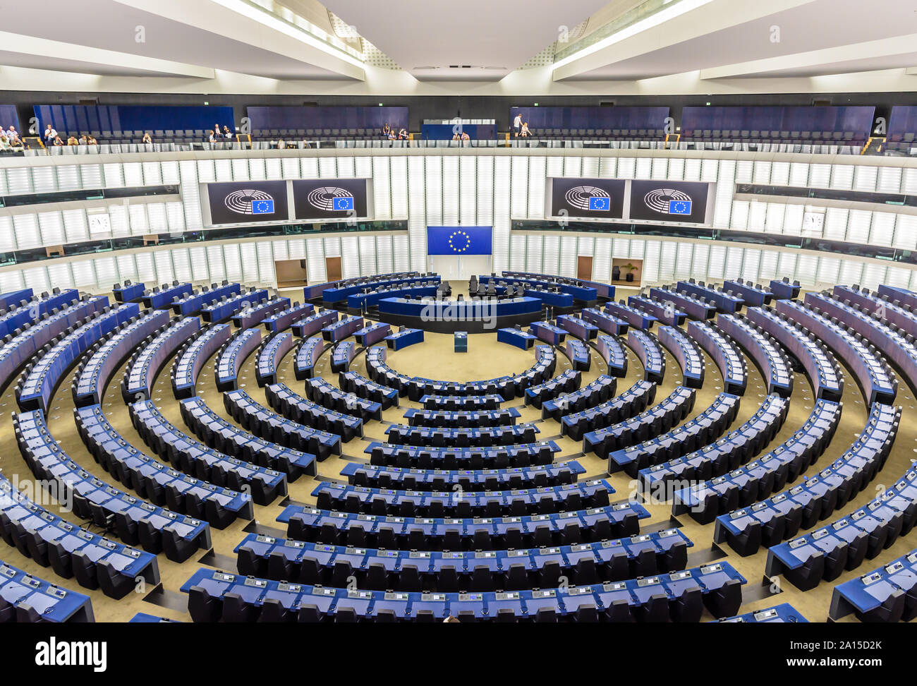 General view of the hemicycle of the European Parliament in Brussels, Belgium, with the flag of the European Union above the desk of the president. Stock Photo