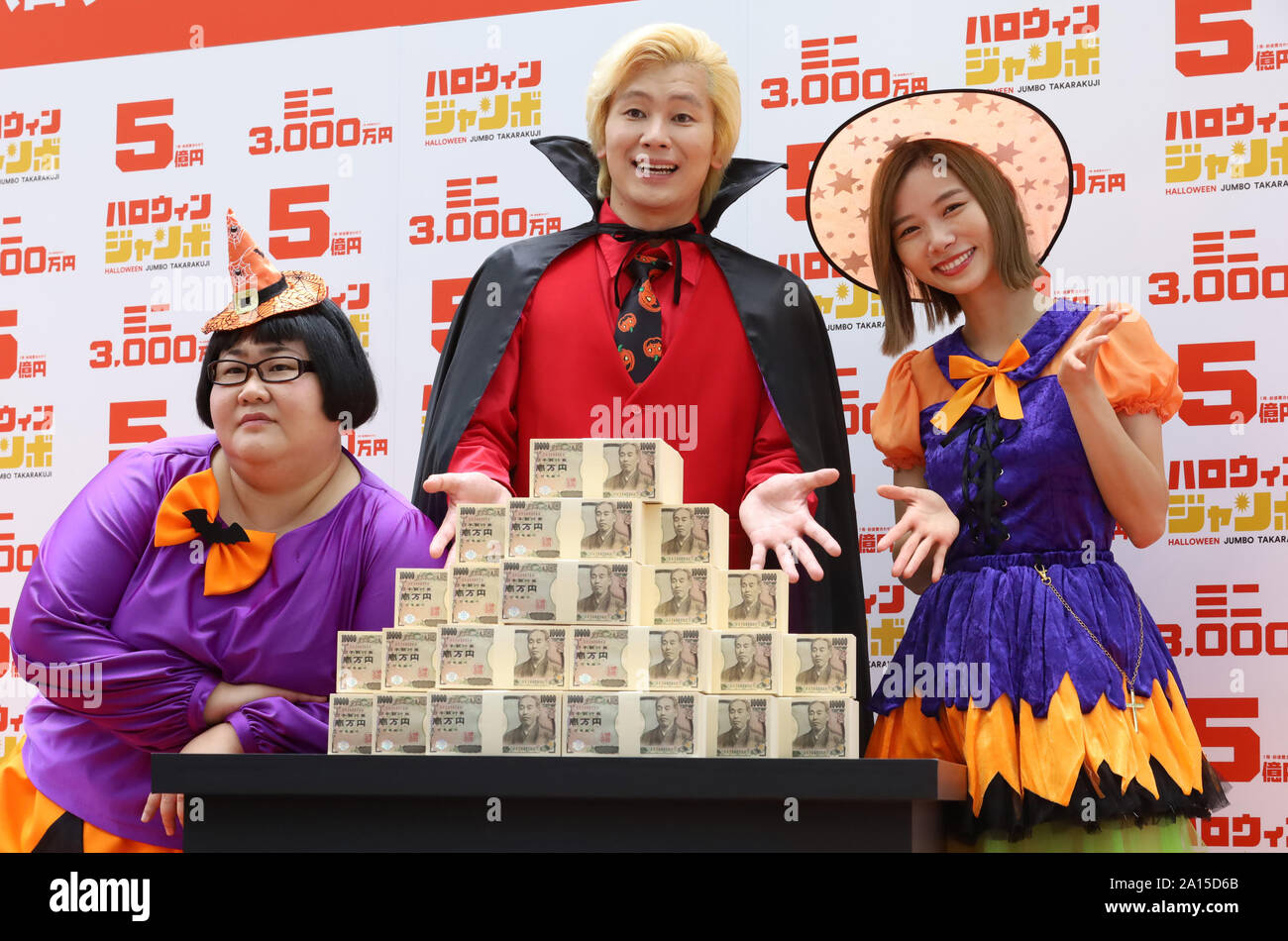 Tokyo, Japan. 24th Sep, 2019. Japanese TV personality Nao Asahi (R) and  comedy duo Maple Superalloy members Kazlaser (C) with Natsu Ando (L) in  costumes attend a promotional event of the 500