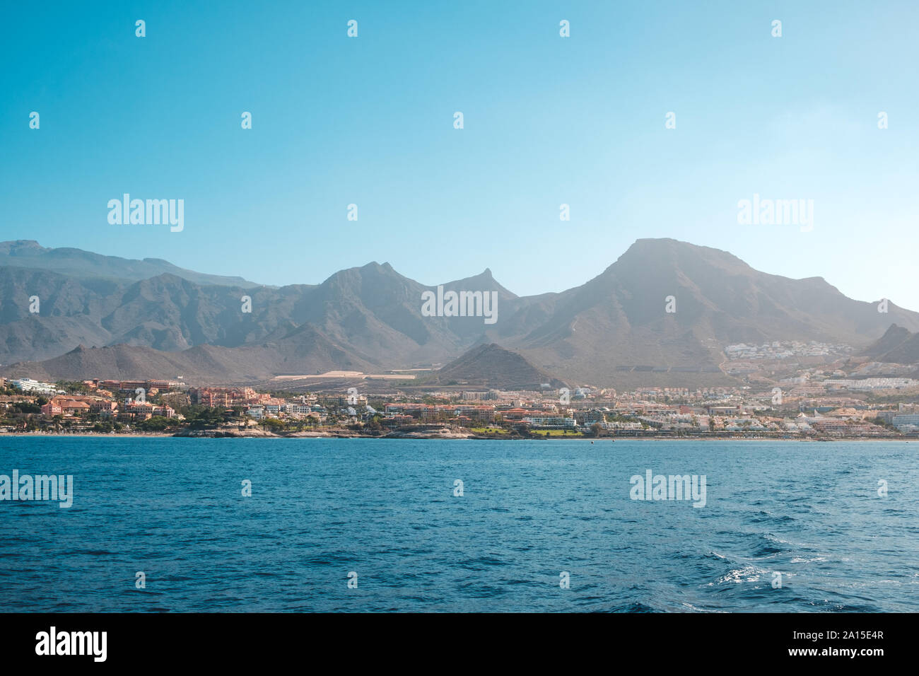 coastal city with mountain landscape background - ocean view shoreline Stock Photo